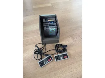 Nintendo 8-bitar NES spel och handkontroller